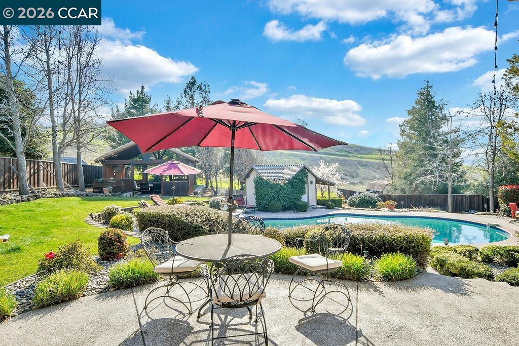 5308 Vista Point Court Concord, CA 94521 - Photo 18 of 56 a view of backyard with outdoor seating and trees