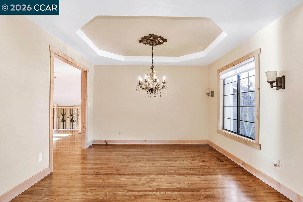 5308 Vista Point Court Concord, CA 94521 - Photo 25 of 56 a view of an empty room with wooden floor and a window