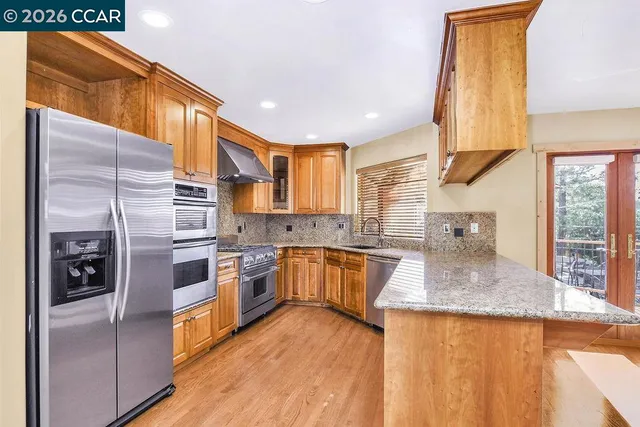 a bathroom with a sink double vanity and a mirror