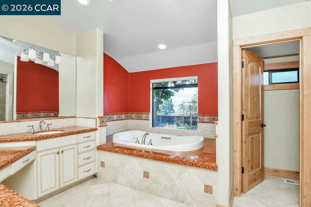 5308 Vista Point Court Concord, CA 94521 - Photo 32 of 56 a bathroom with a tub sink and mirror