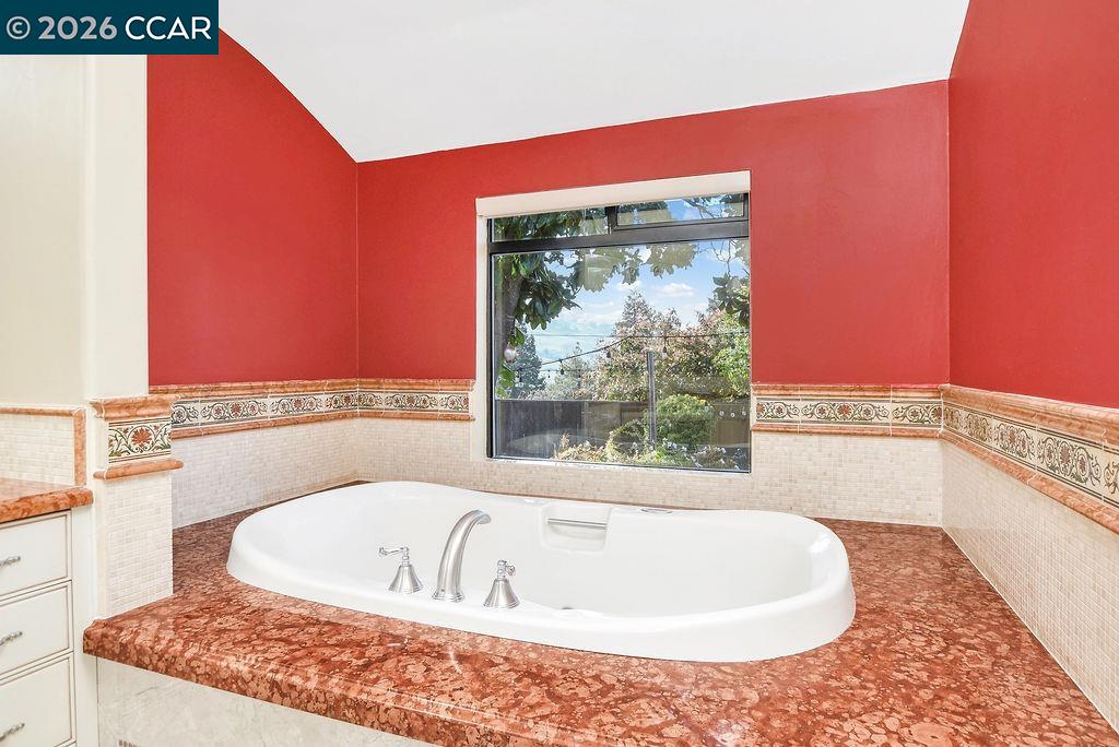 5308 Vista Point Court Concord, CA 94521 - Photo 34 of 56 a bathroom with bathtub and window