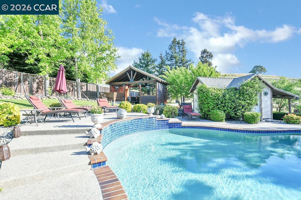 5308 Vista Point Court Concord, CA 94521 - Photo 41 of 56 a swimming pool with outdoor seating and yard