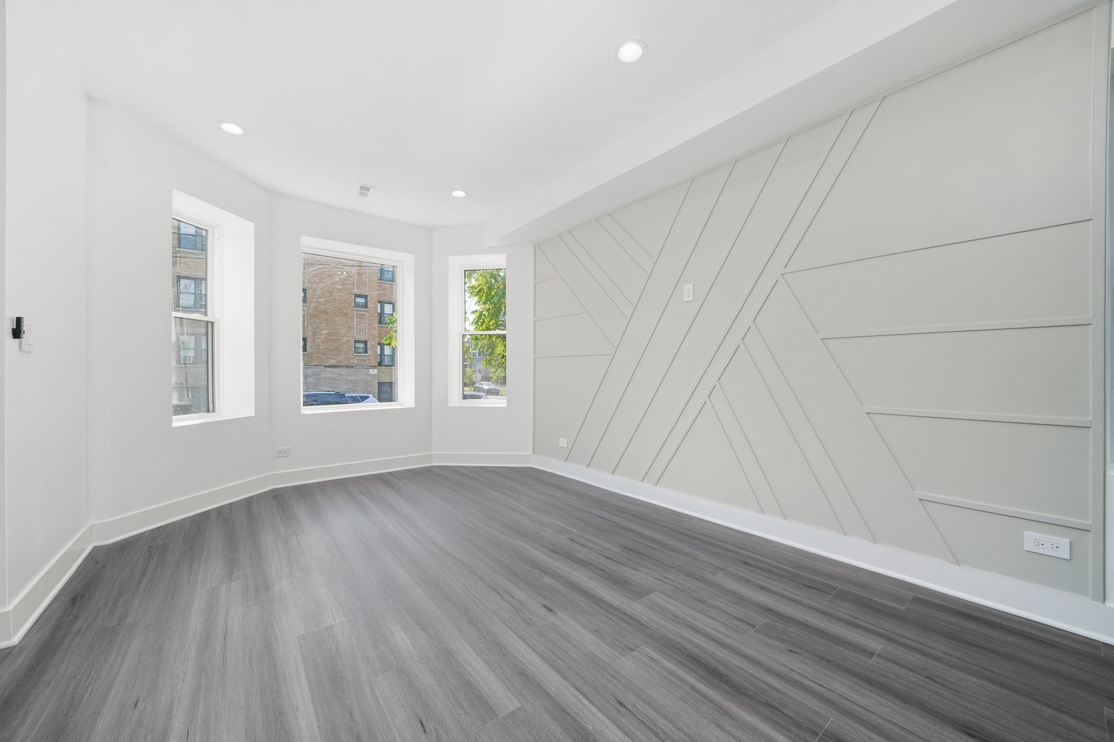 322 South Kostner Avenue Chicago, IL 60624 - Photo 15 of 35 wooden floor in an empty room with a window
