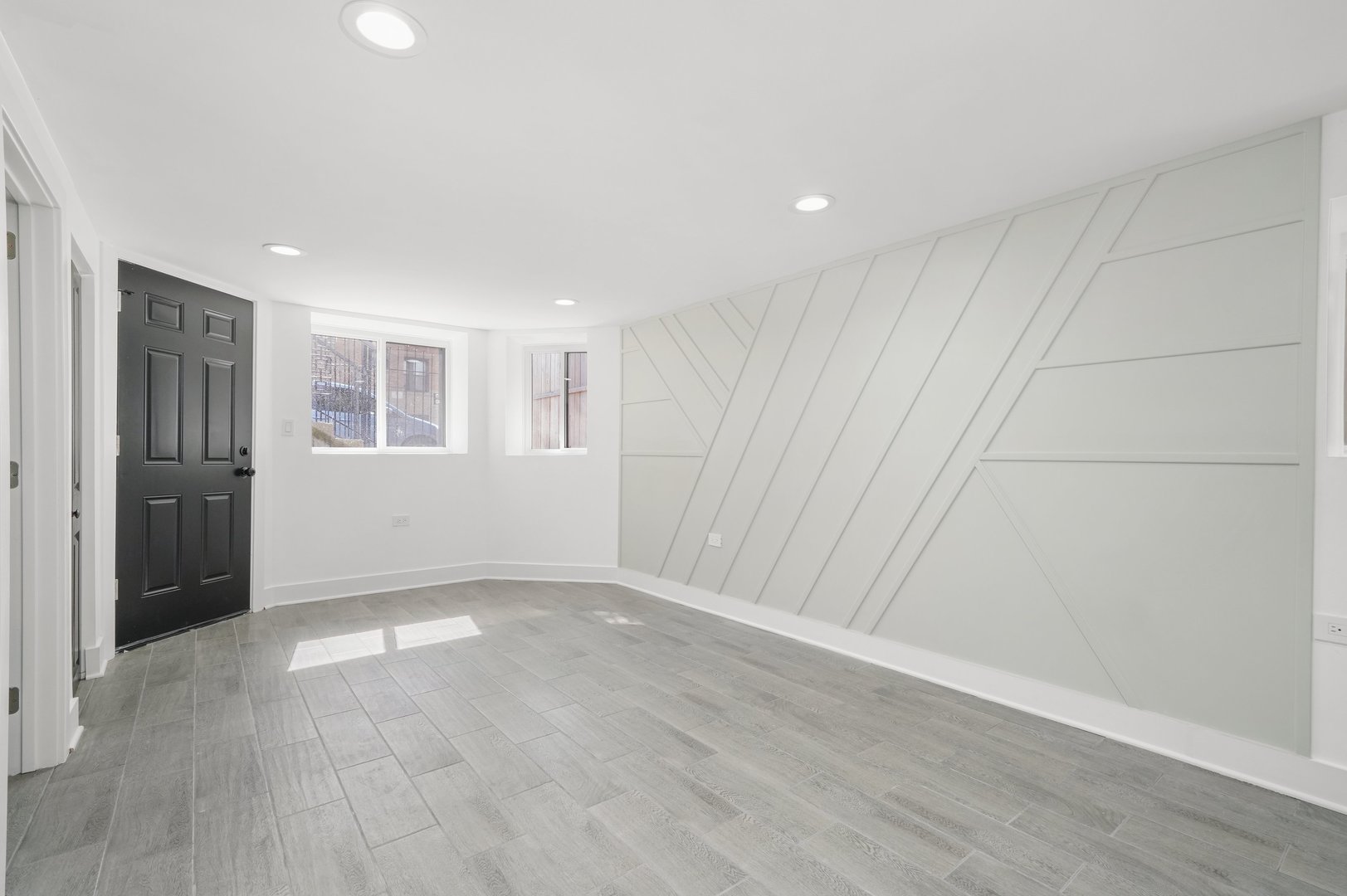 322 South Kostner Avenue Chicago, IL 60624 - Photo 22 of 35 an empty room with wooden floor and windows