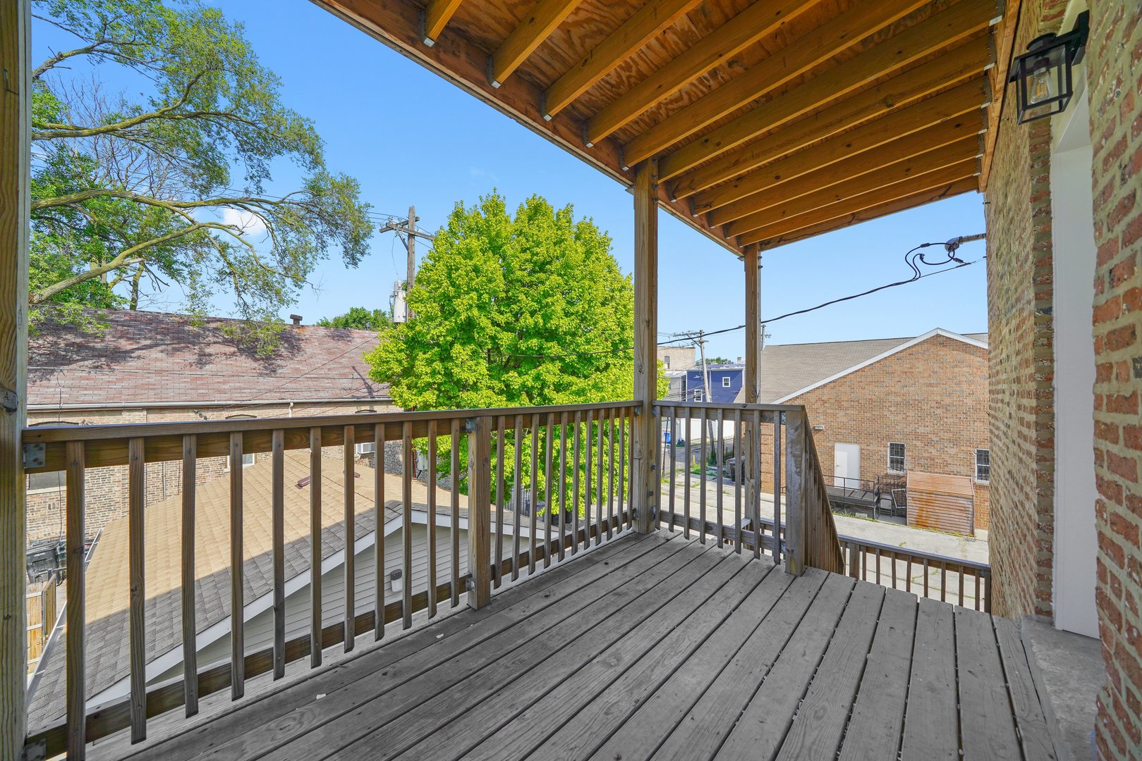 322 South Kostner Avenue Chicago, IL 60624 - Photo 26 of 35 a view of balcony with wooden floor