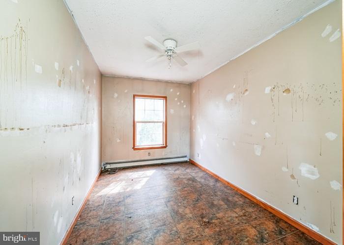 62 Hillview Lane Tioga, PA 16946 - Photo 11 of 13 a view of an empty room with a window