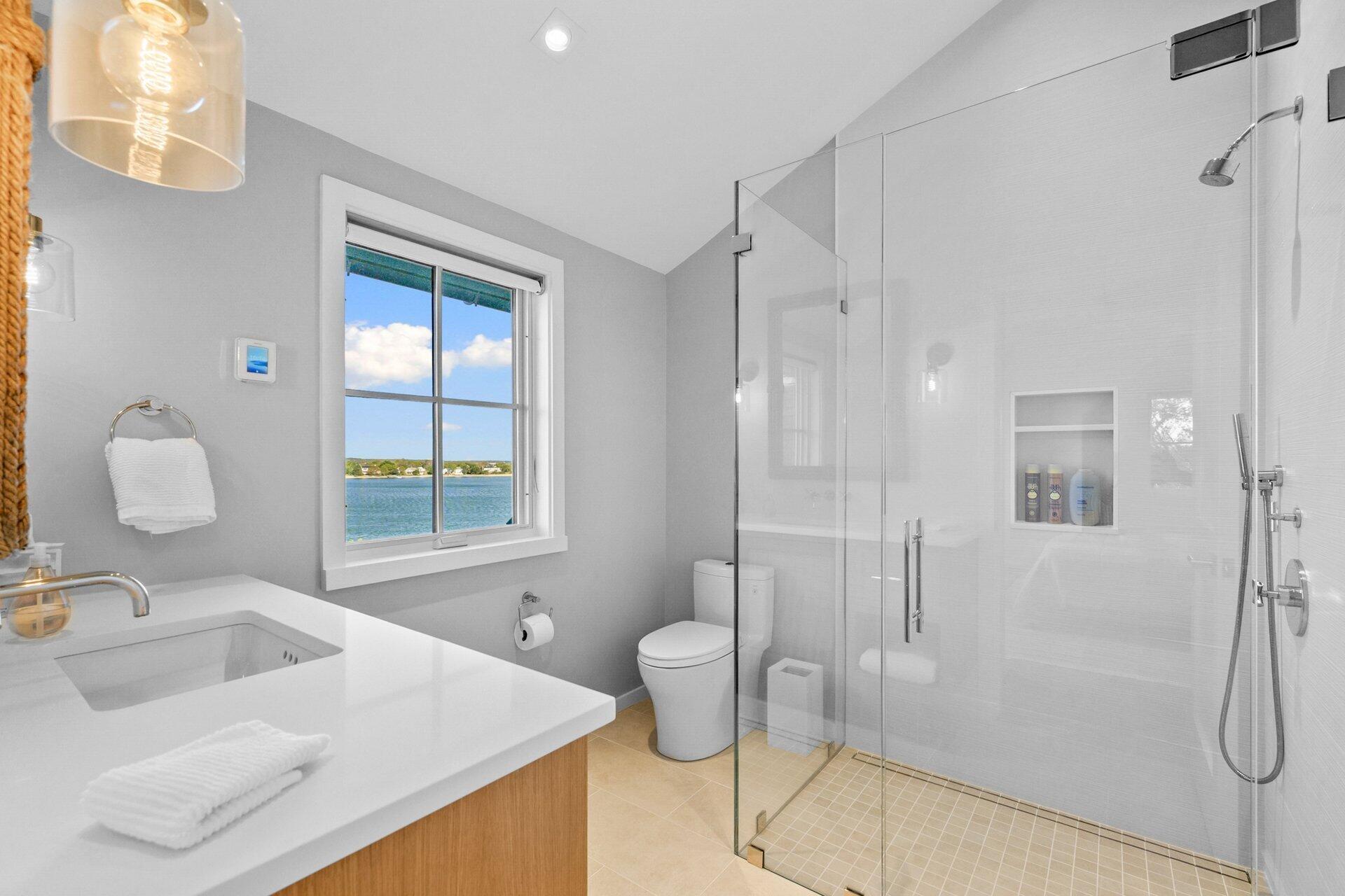 301 Whidah Road North Chatham, MA 02650 - Photo 31 of 52 a bathroom with a sink toilet and shower