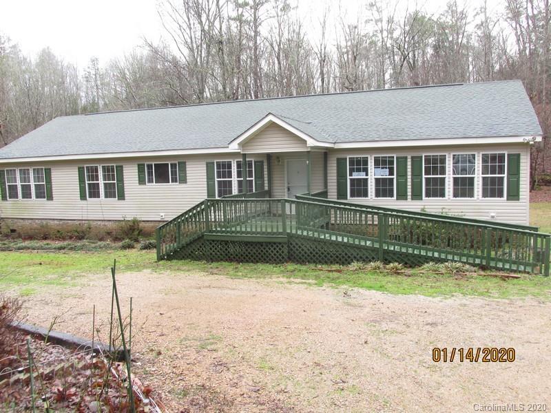939 A Pinckney Road Chester, SC 29706 - Photo 1 of 14 a front view of a house with a yard and trees