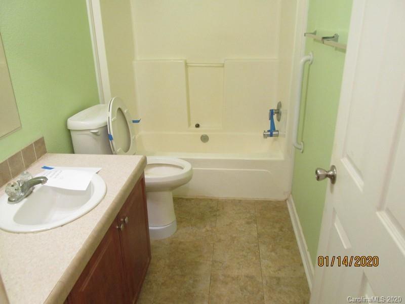 939 A Pinckney Road Chester, SC 29706 - Photo 6 of 14 a bathroom with a sink a toilet and shower