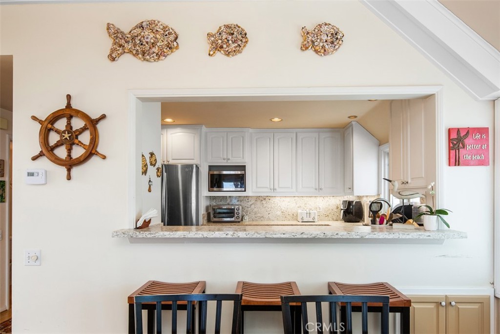 181 Sunset Terrace Laguna Beach, CA 92651 - Photo 45 of 54 Countertop bar to Kitchen