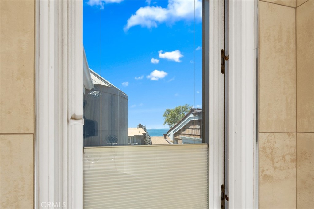 181 Sunset Terrace Laguna Beach, CA 92651 - Photo 51 of 54 Peek- a book Ocean View from Shower.