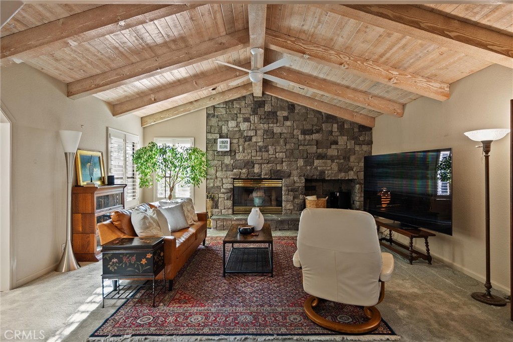 529 Countryside Lane Chico, CA 95973 - Photo 13 of 51 a living room with furniture a fireplace and a flat screen tv