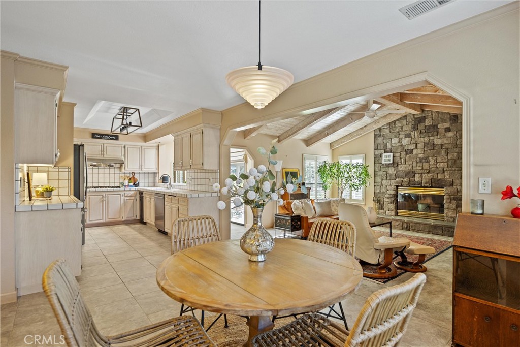529 Countryside Lane Chico, CA 95973 - Photo 15 of 51 a view of a dining room with furniture and a chandelier