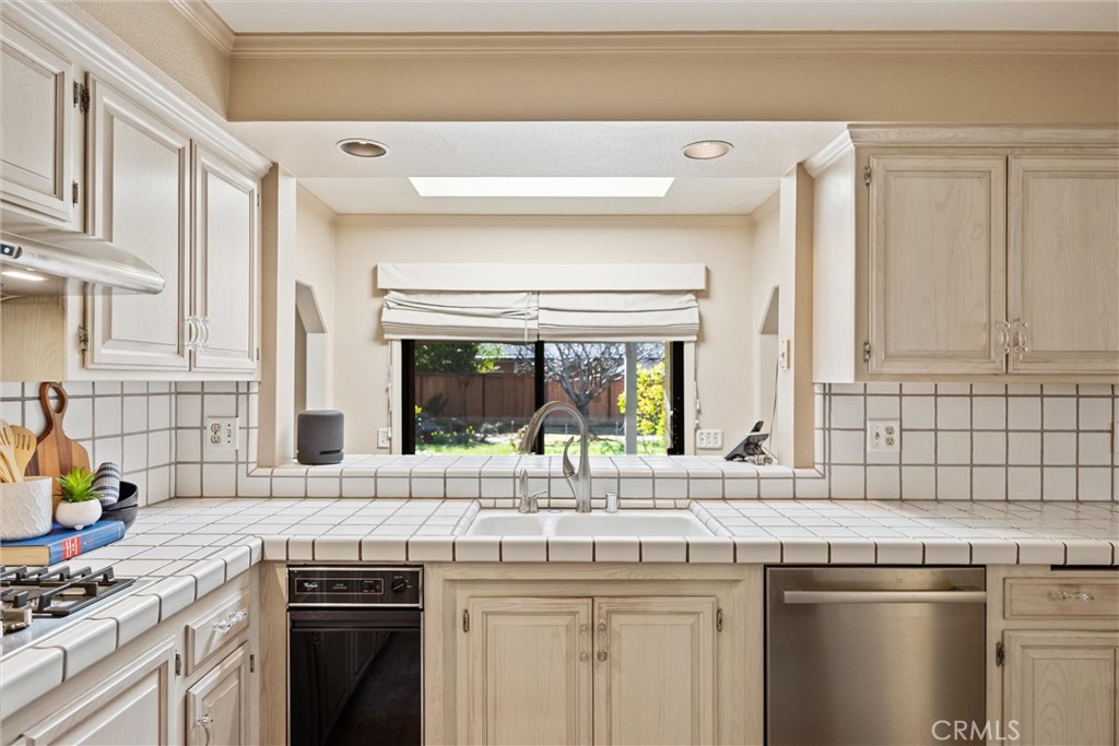 529 Countryside Lane Chico, CA 95973 - Photo 24 of 51 a kitchen with stainless steel appliances granite countertop a sink and a stove