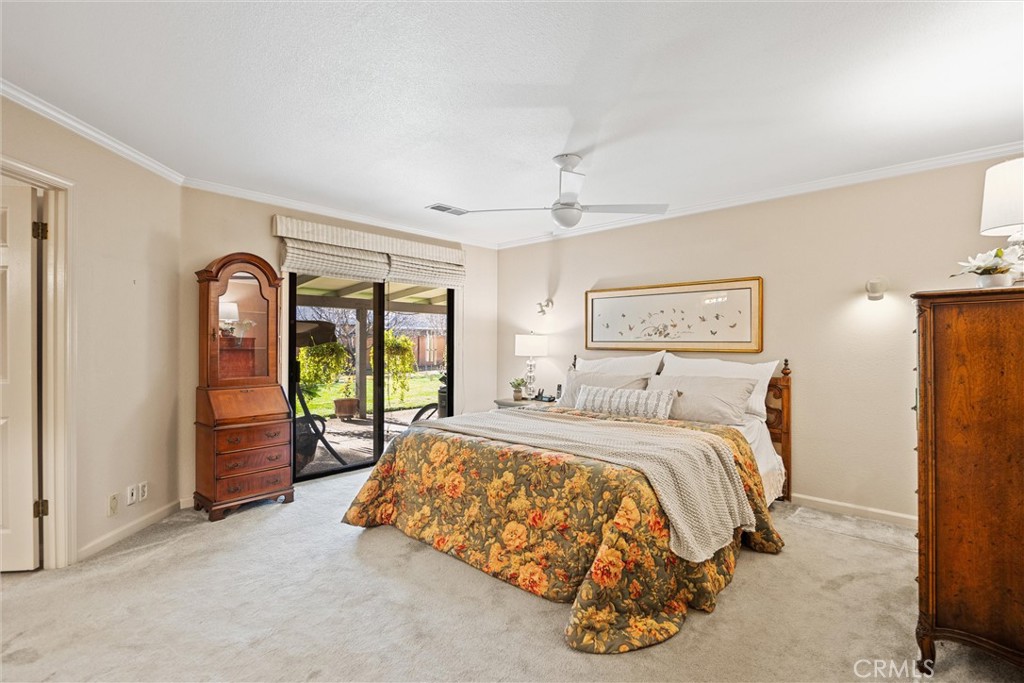 529 Countryside Lane Chico, CA 95973 - Photo 26 of 51 a bedroom with a bed and a night stand