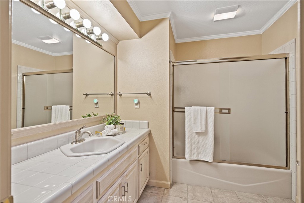 529 Countryside Lane Chico, CA 95973 - Photo 35 of 51 a bathroom with a sink and a mirror
