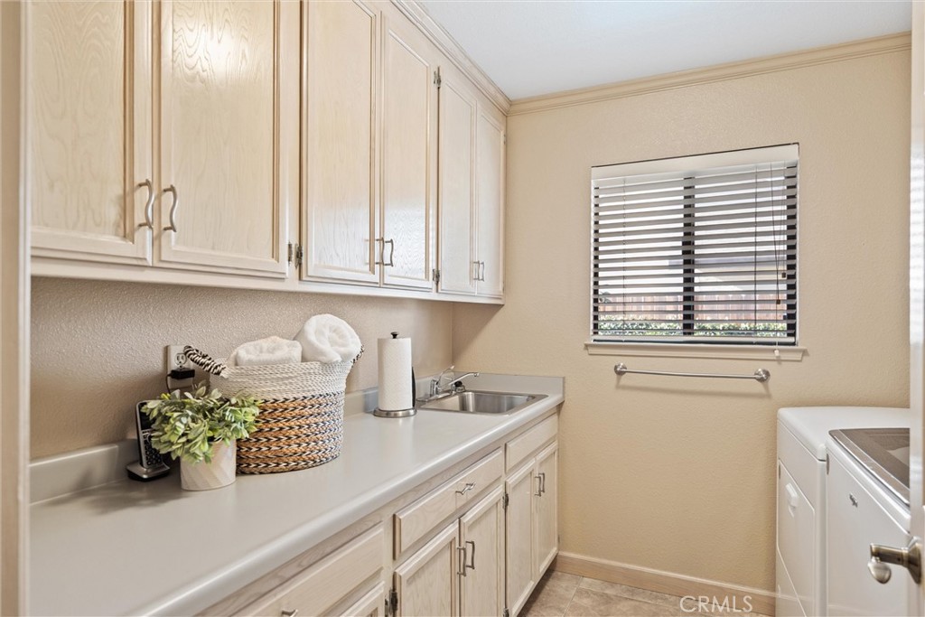 529 Countryside Lane Chico, CA 95973 - Photo 36 of 51 a kitchen with stainless steel appliances granite countertop a sink window and cabinets
