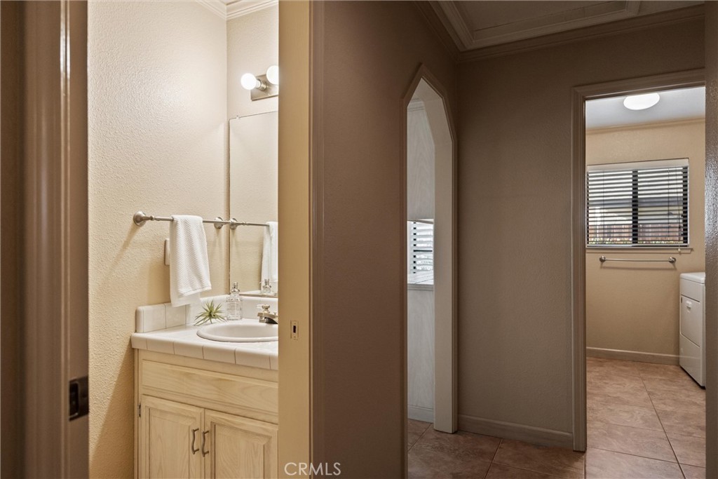 529 Countryside Lane Chico, CA 95973 - Photo 37 of 51 a bathroom with a sink and a mirror