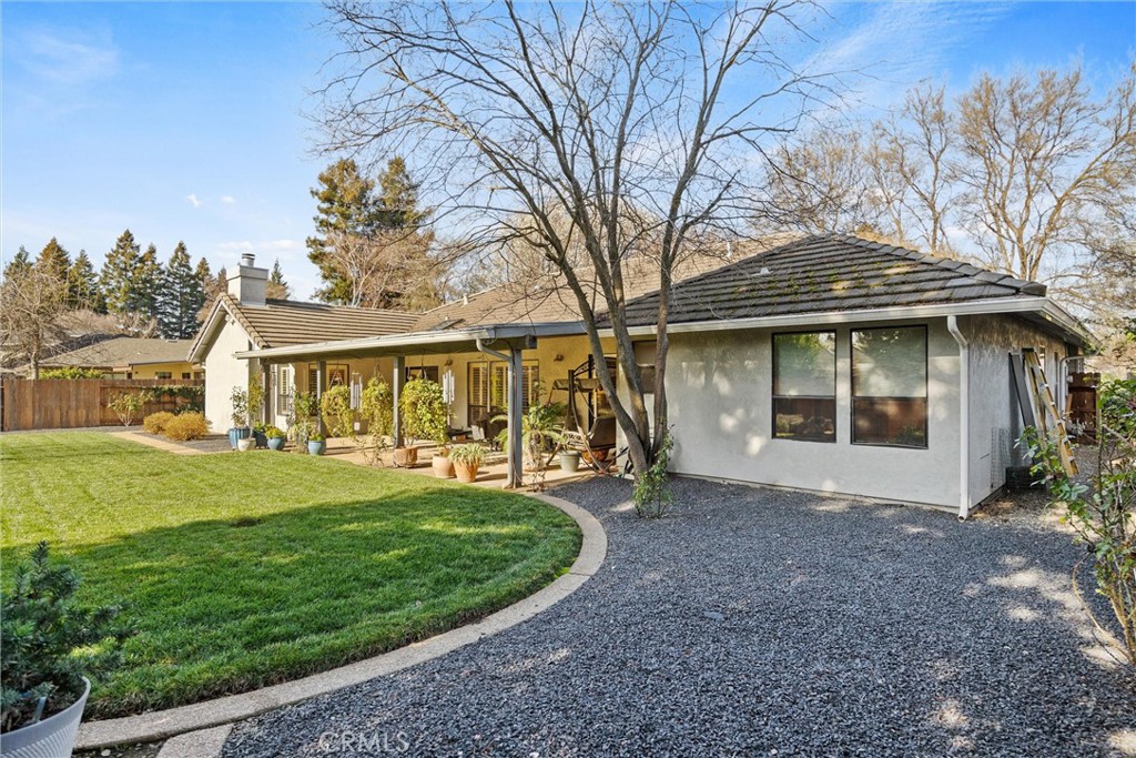 529 Countryside Lane Chico, CA 95973 - Photo 42 of 51 a front view of a house with a yard