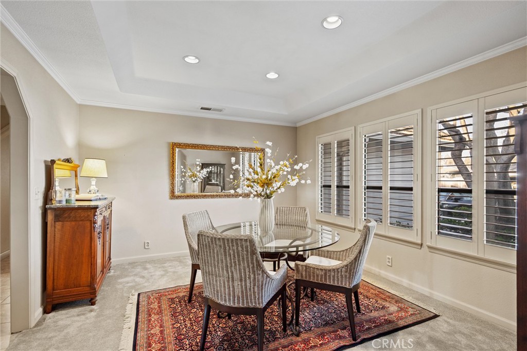 529 Countryside Lane Chico, CA 95973 - Photo 7 of 51 a dining room with furniture a window and wooden floor