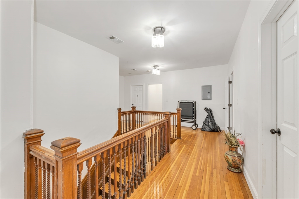 36 Brookledge Street Boston, MA 02121 - Photo 23 of 31 a view of a hallway with the wooden floor