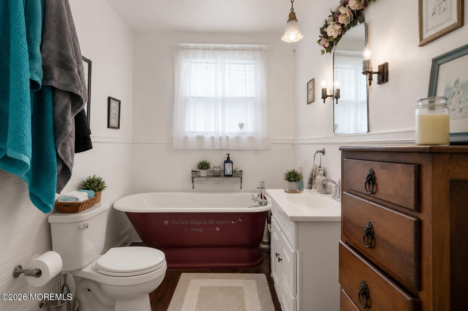 24 Foster Street Middletown, NJ 07701 - Photo 9 of 23 a bathroom with a sink toilet and a mirror