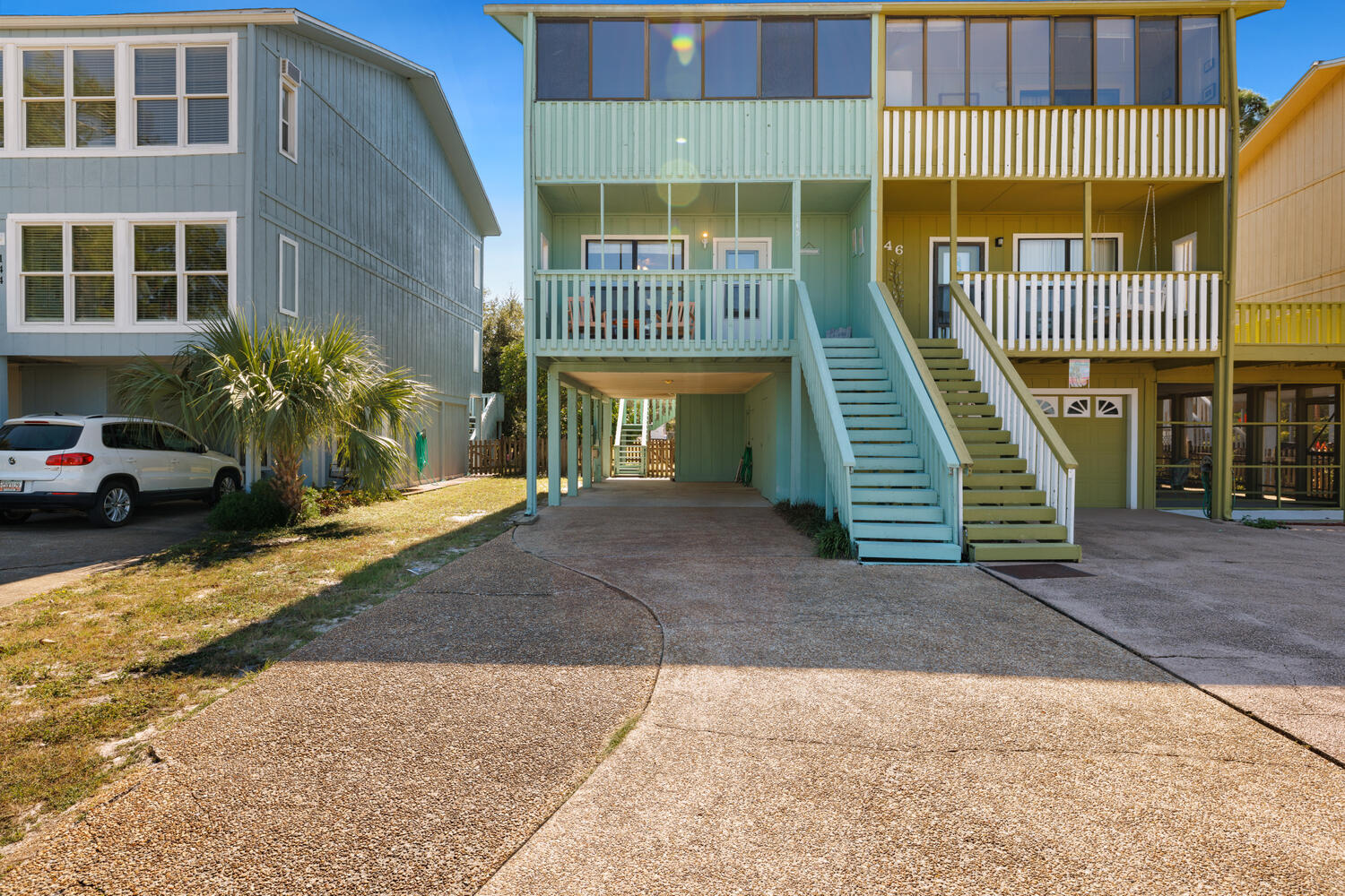 145 Cain Road Panama City Beach, FL 32413 - Photo 11 of 60 a front view of a house with a yard