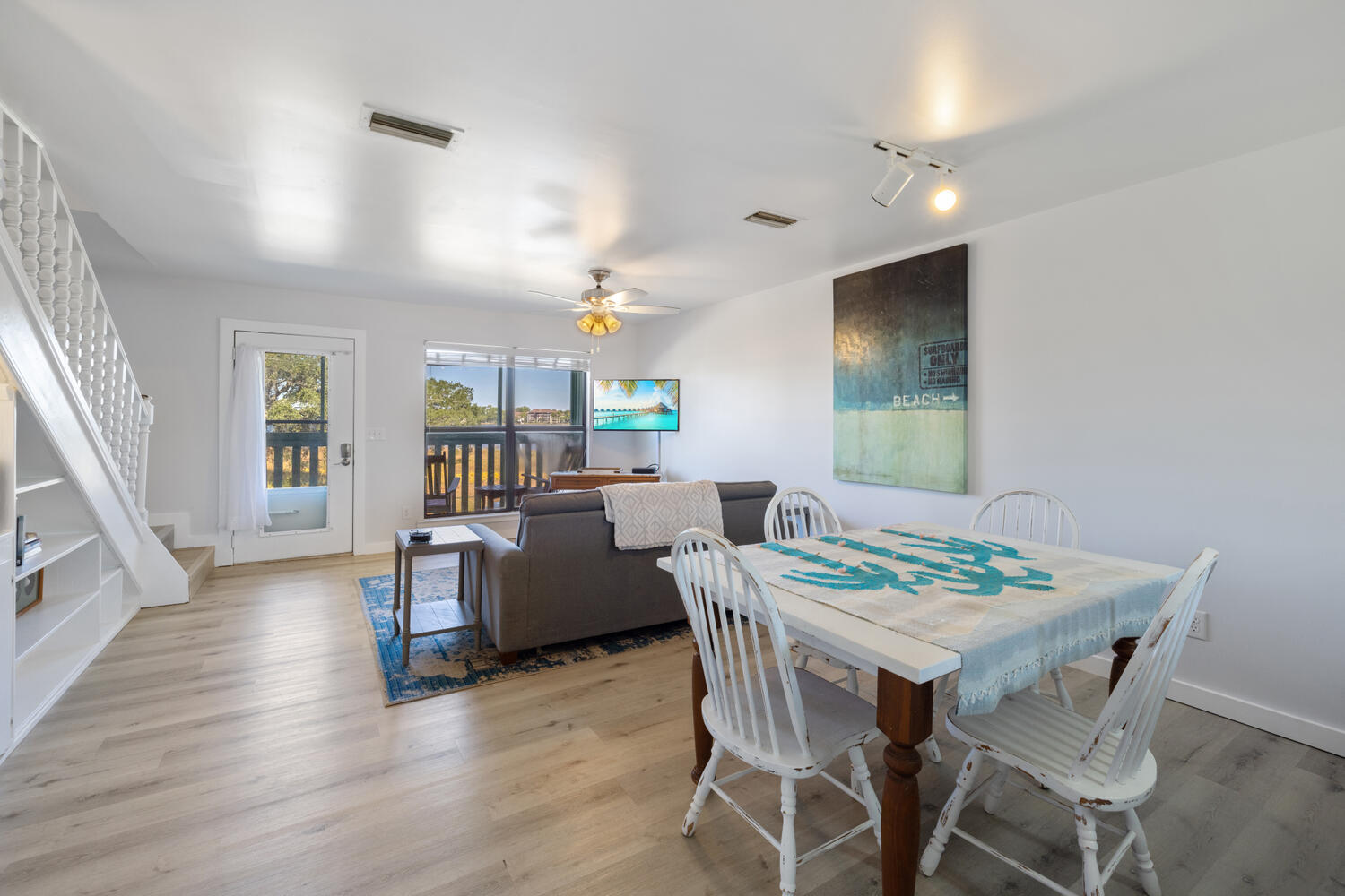 145 Cain Road Panama City Beach, FL 32413 - Photo 34 of 60 a view of a dining room with furniture