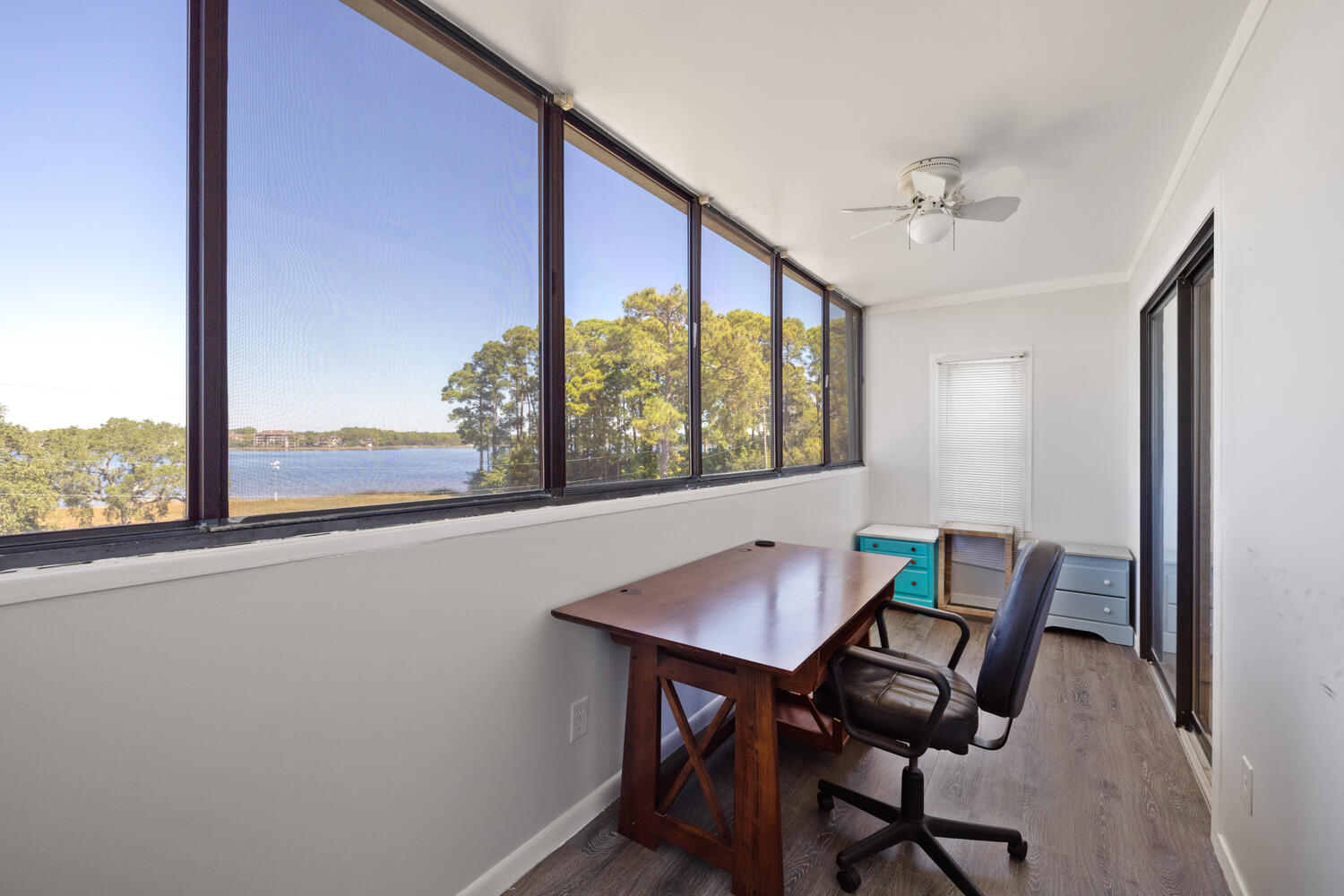 145 Cain Road Panama City Beach, FL 32413 - Photo 38 of 60 a view of a workspace with furniture and a window