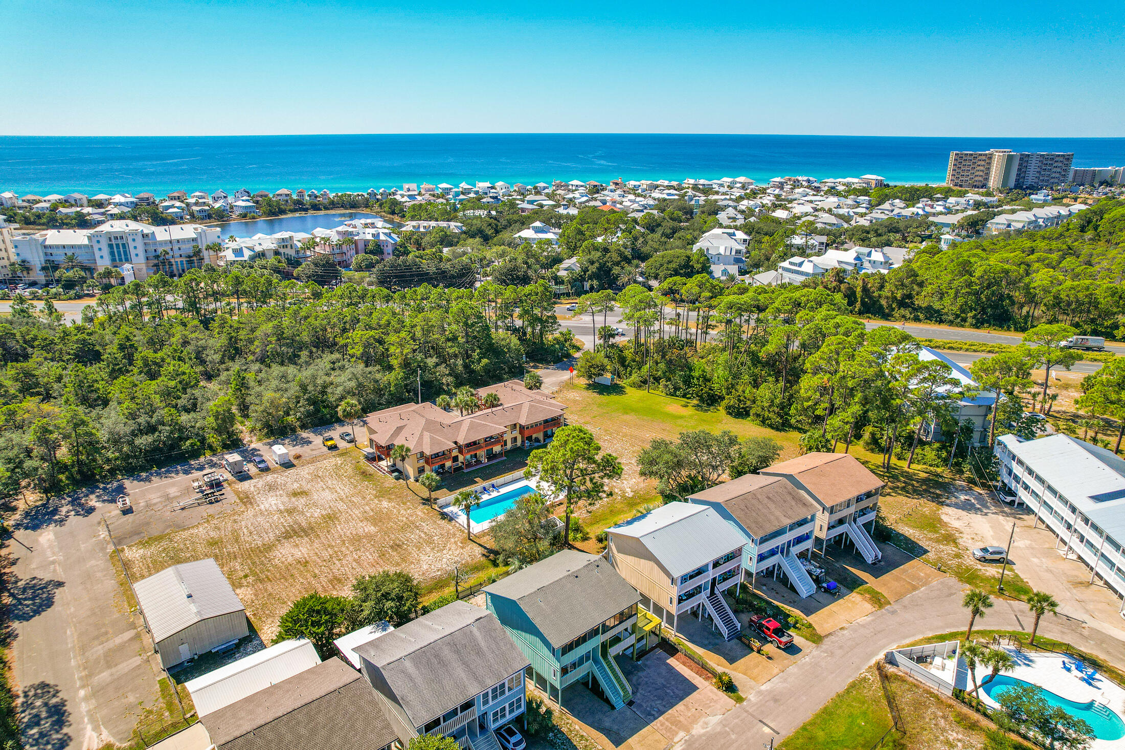 145 Cain Road Panama City Beach, FL 32413 - Photo 42 of 60 an aerial view of residential houses with outdoor space and ocean