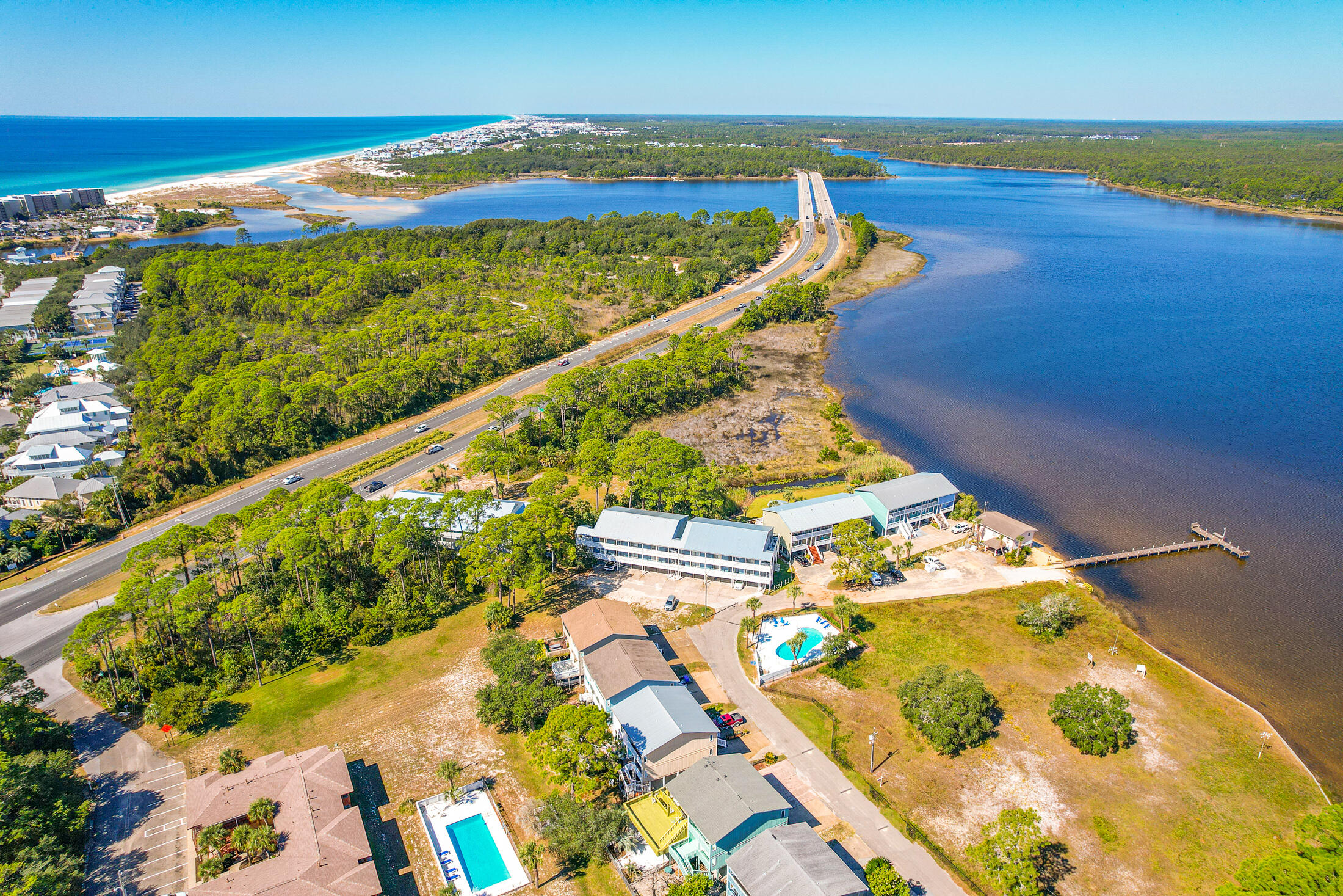 145 Cain Road Panama City Beach, FL 32413 - Photo 45 of 60 a view of swimming pool with a garden
