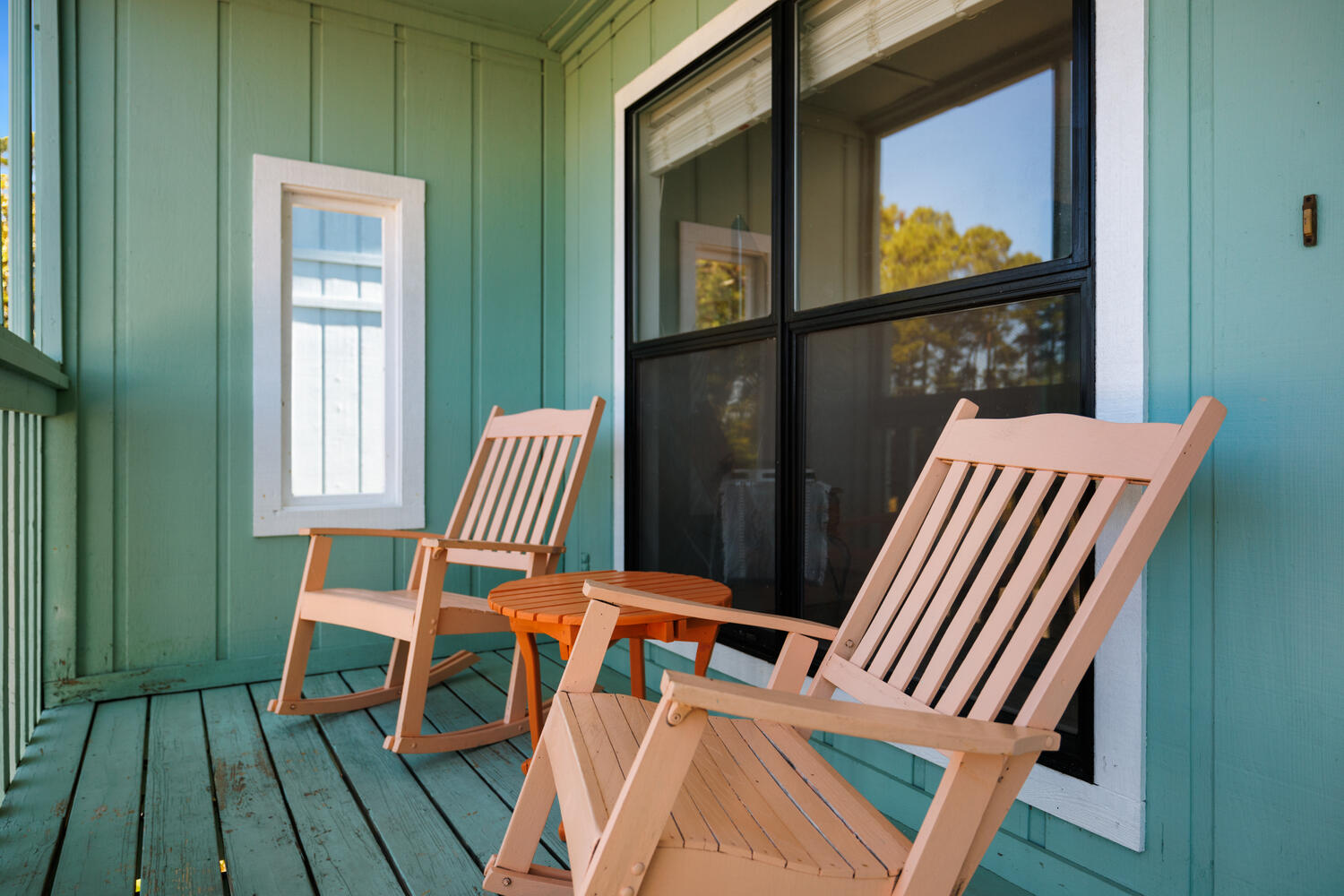 145 Cain Road Panama City Beach, FL 32413 - Photo 5 of 60 a view of a balcony with chair and wooden floor