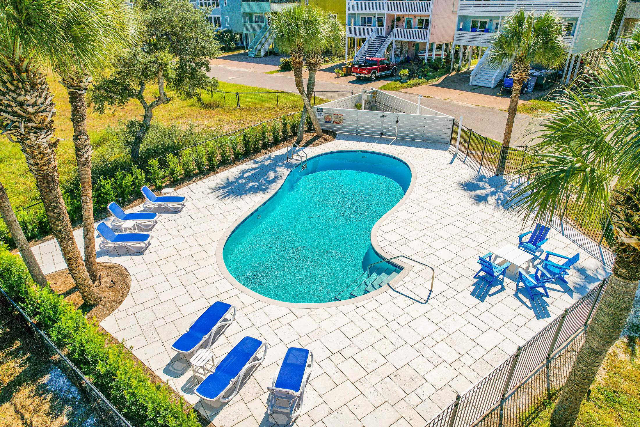 145 Cain Road Panama City Beach, FL 32413 - Photo 54 of 60 a view of swimming pool outdoor seating