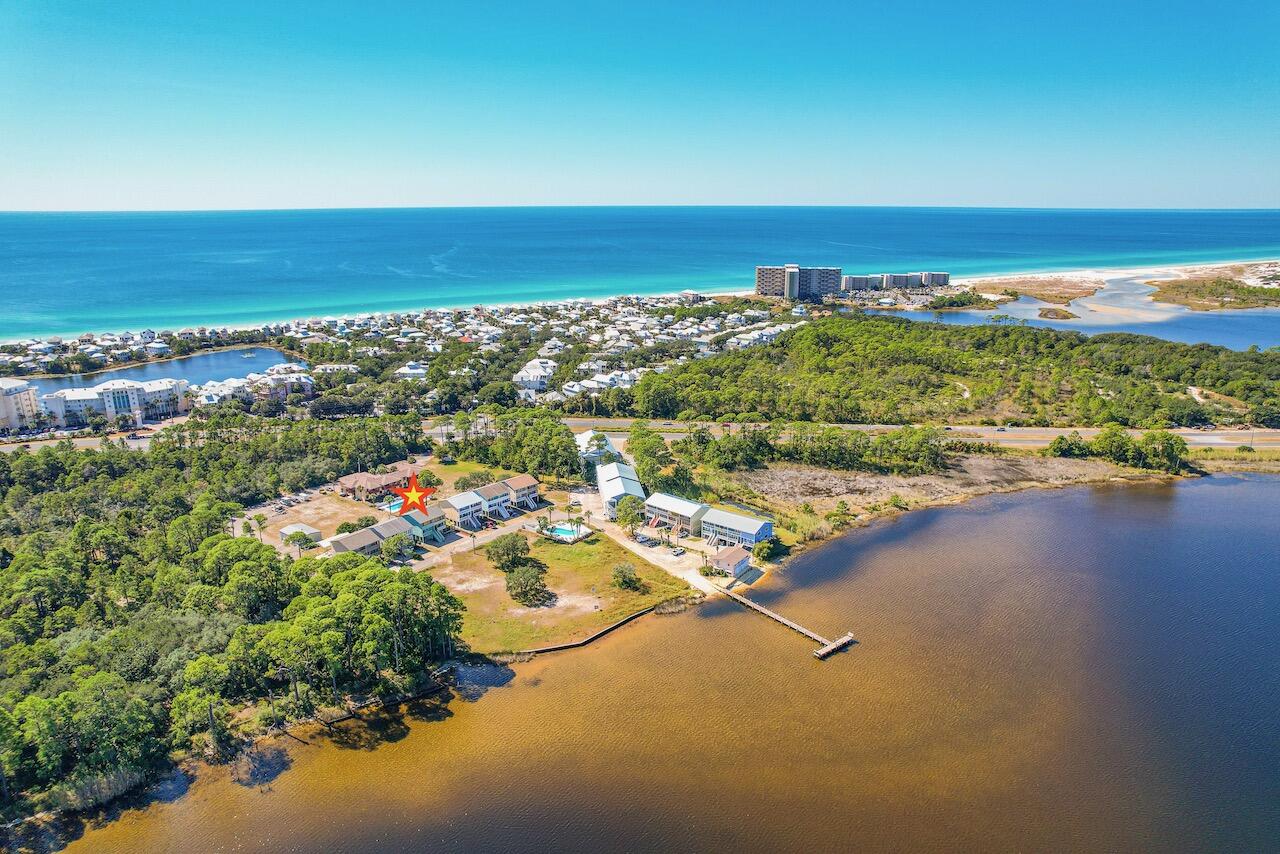 145 Cain Road Panama City Beach, FL 32413 - Photo 59 of 60 a view of a city with an ocean