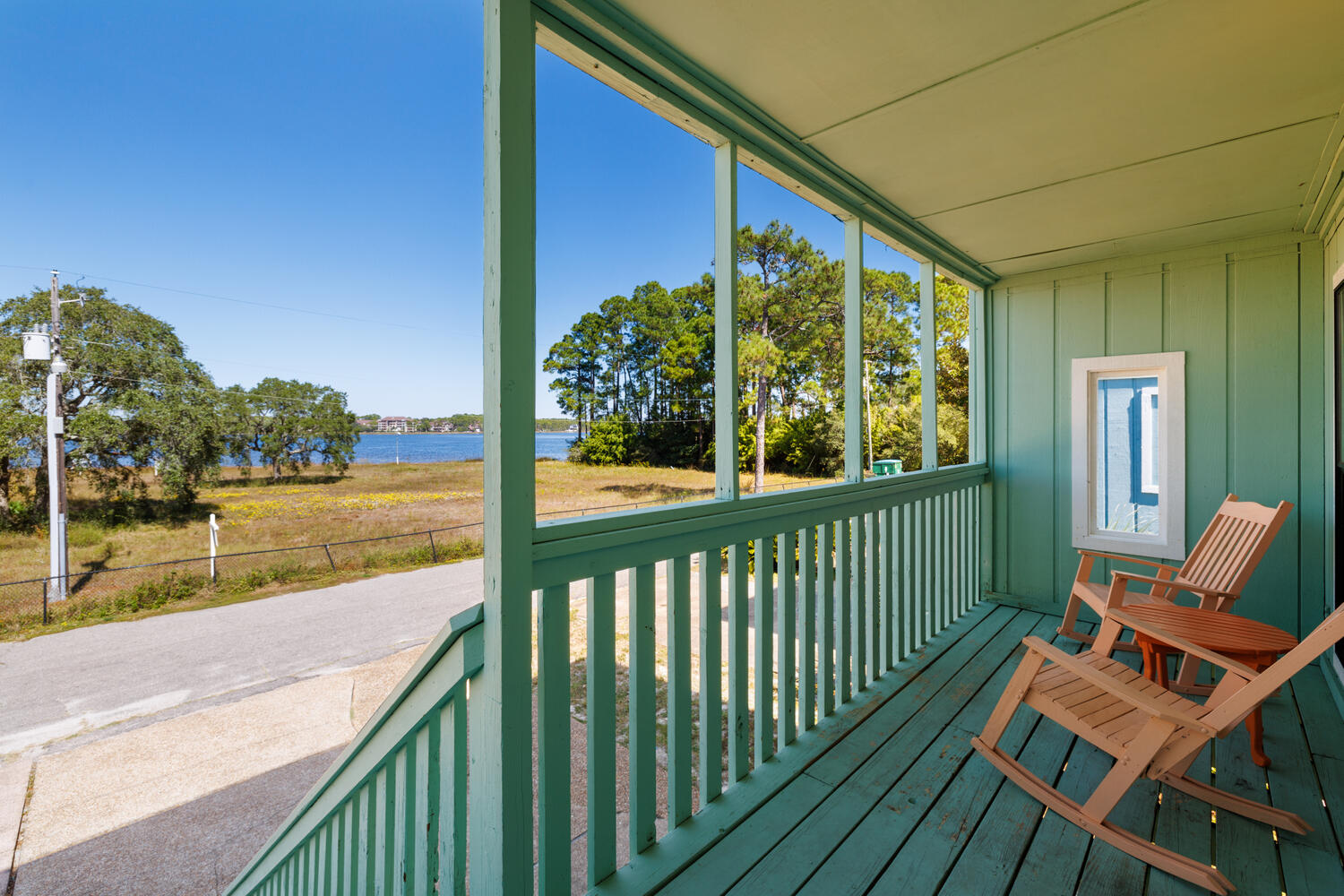 145 Cain Road Panama City Beach, FL 32413 - Photo 6 of 60 a view of a two chair in the balcony