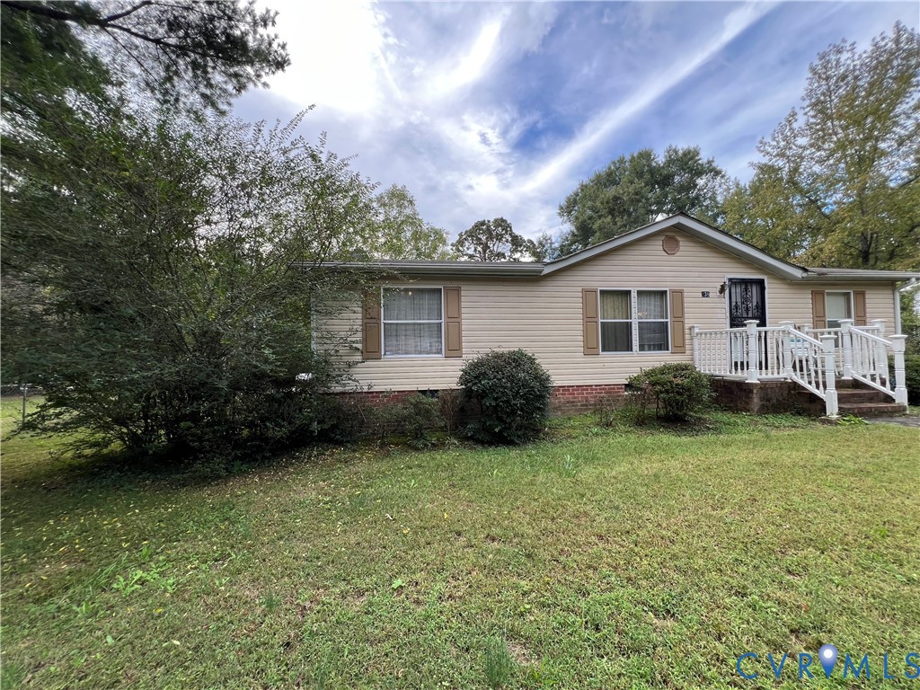 238 Samford Street Alberta, VA 23821 - Photo 1 of 10 View of side of property with a yard and crawl spa