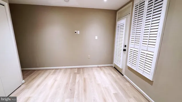 a view of a hallway with washer and dryer