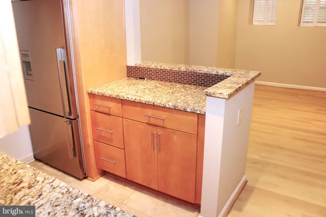 a bedroom with a bed and a cabinets