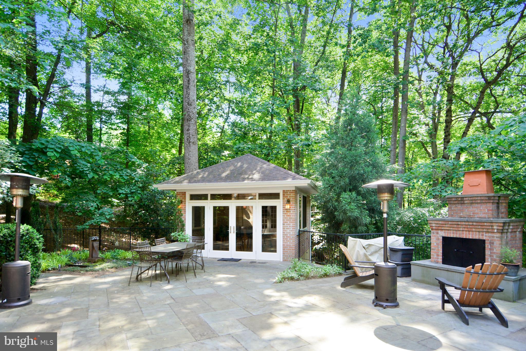 1688 Coventry Place Annapolis, MD 21401 - Photo 12 of 30 a view of a patio with table and chairs and potted plants with large tree