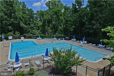 1688 Coventry Place Annapolis, MD 21401 - Photo 16 of 30 a view of a swimming pool with a patio