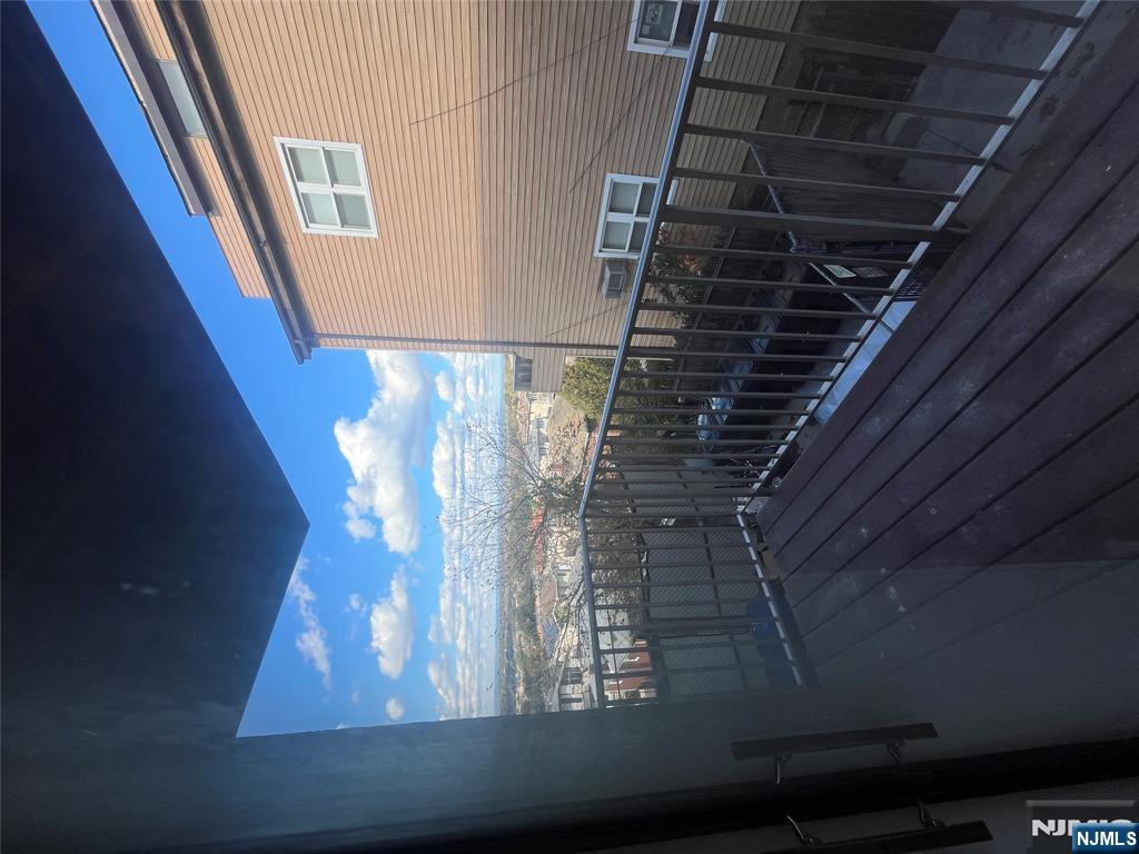 201 12th Street, Unit 6 Palisades Park, NJ 07650 - Photo 6 of 19 a view of balcony with furniture