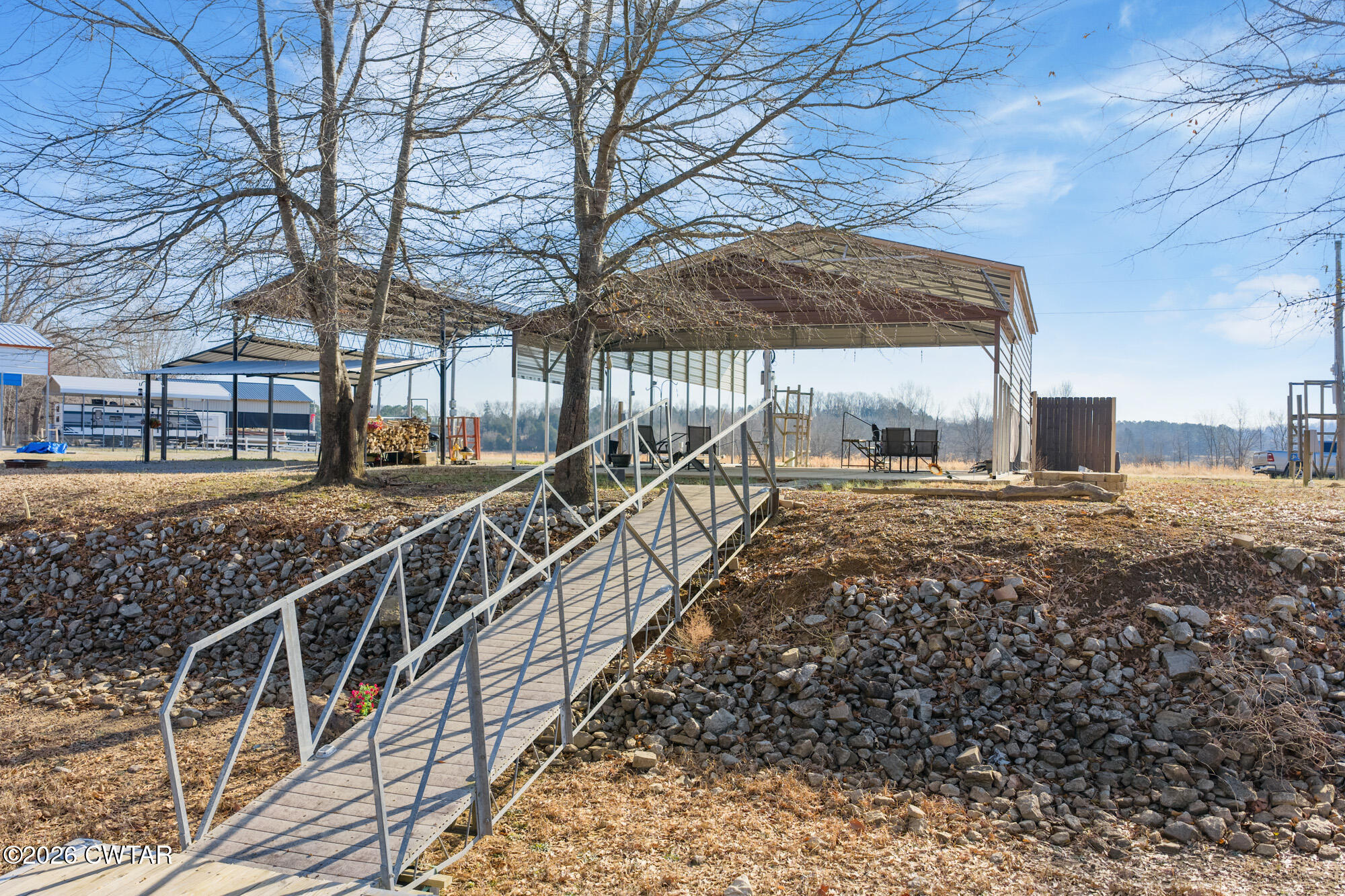 267 Dd Cove Decaturville, TN 38329 - Photo 13 of 60 a view of a house with a yard