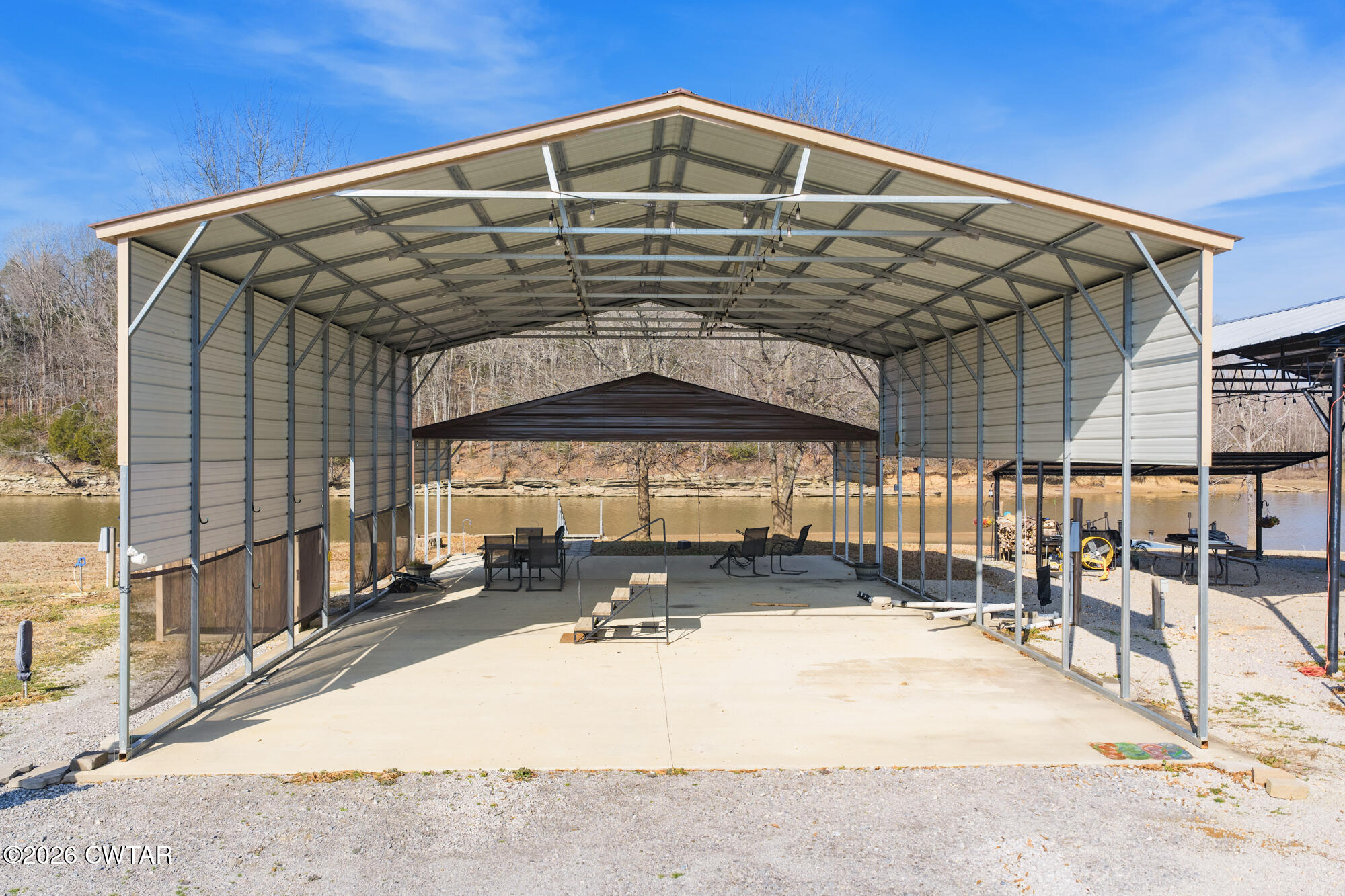 267 Dd Cove Decaturville, TN 38329 - Photo 4 of 60 a view of a building with a patio
