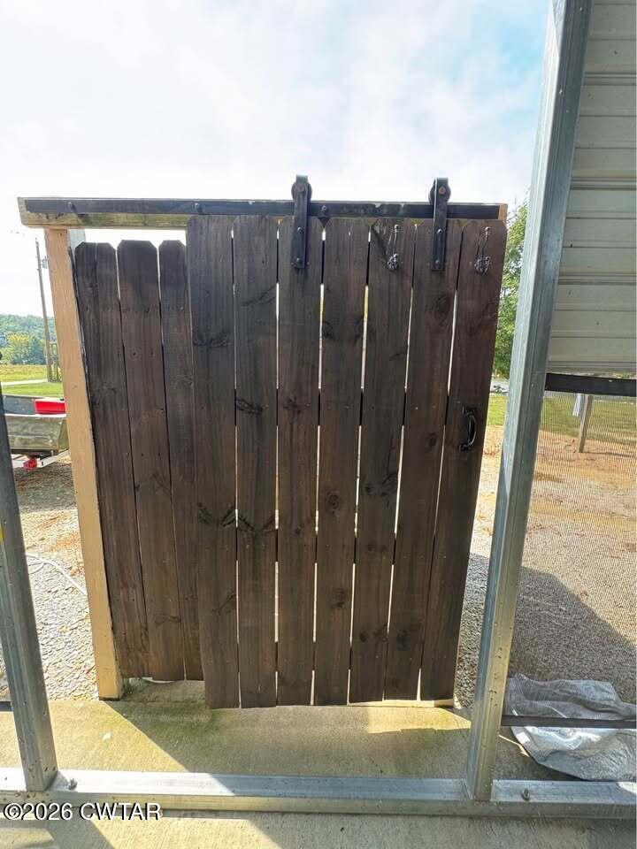 267 Dd Cove Decaturville, TN 38329 - Photo 59 of 60 a view of a wooden door