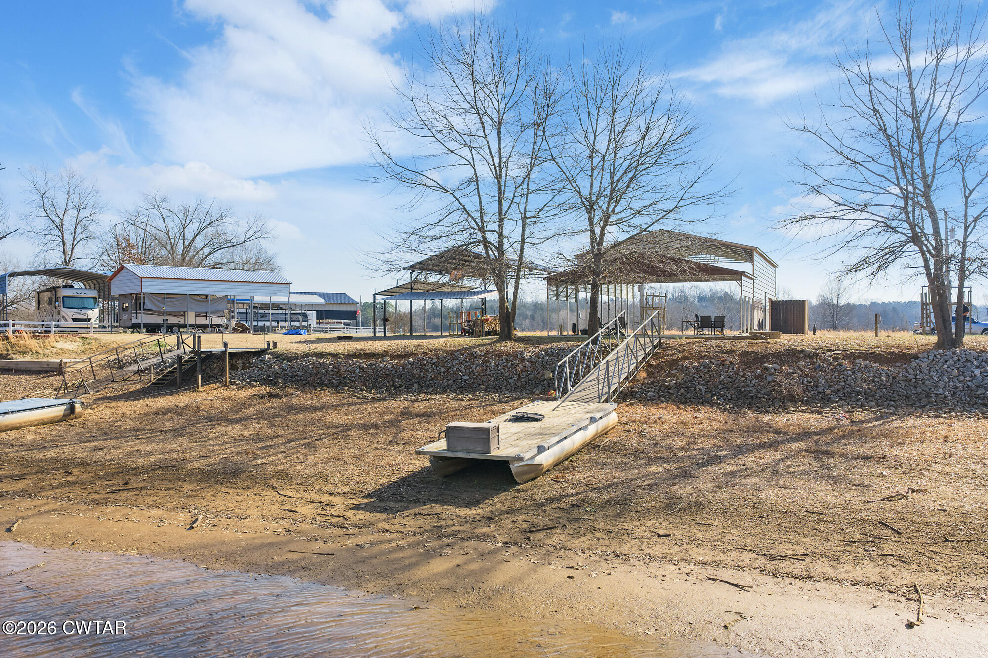 267 Dd Cove Decaturville, TN 38329 - Photo 9 of 60 a view of a lake with houses