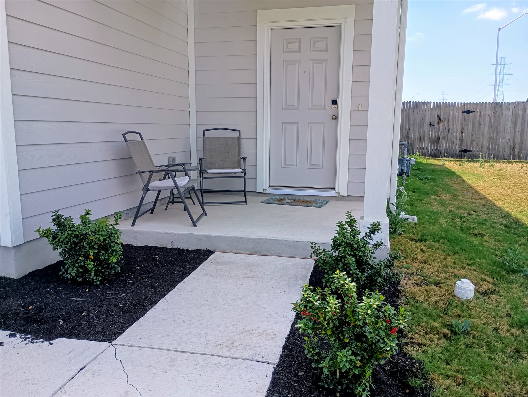 Property entrance with a porch