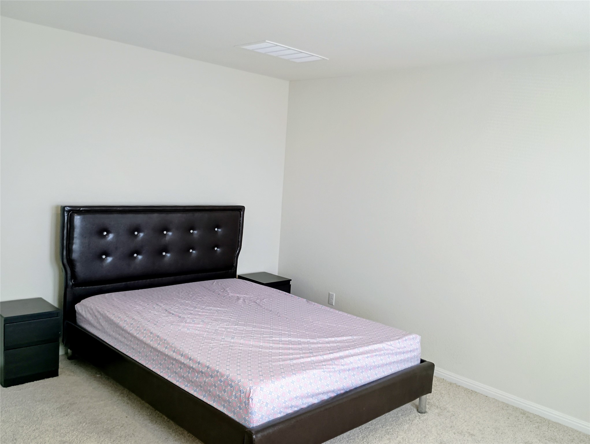 10615 Ridan Way Buda, TX 78610 - Photo 12 of 21 Bedroom featuring carpet floors and baseboards