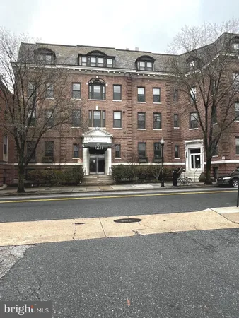 a view of building with yard