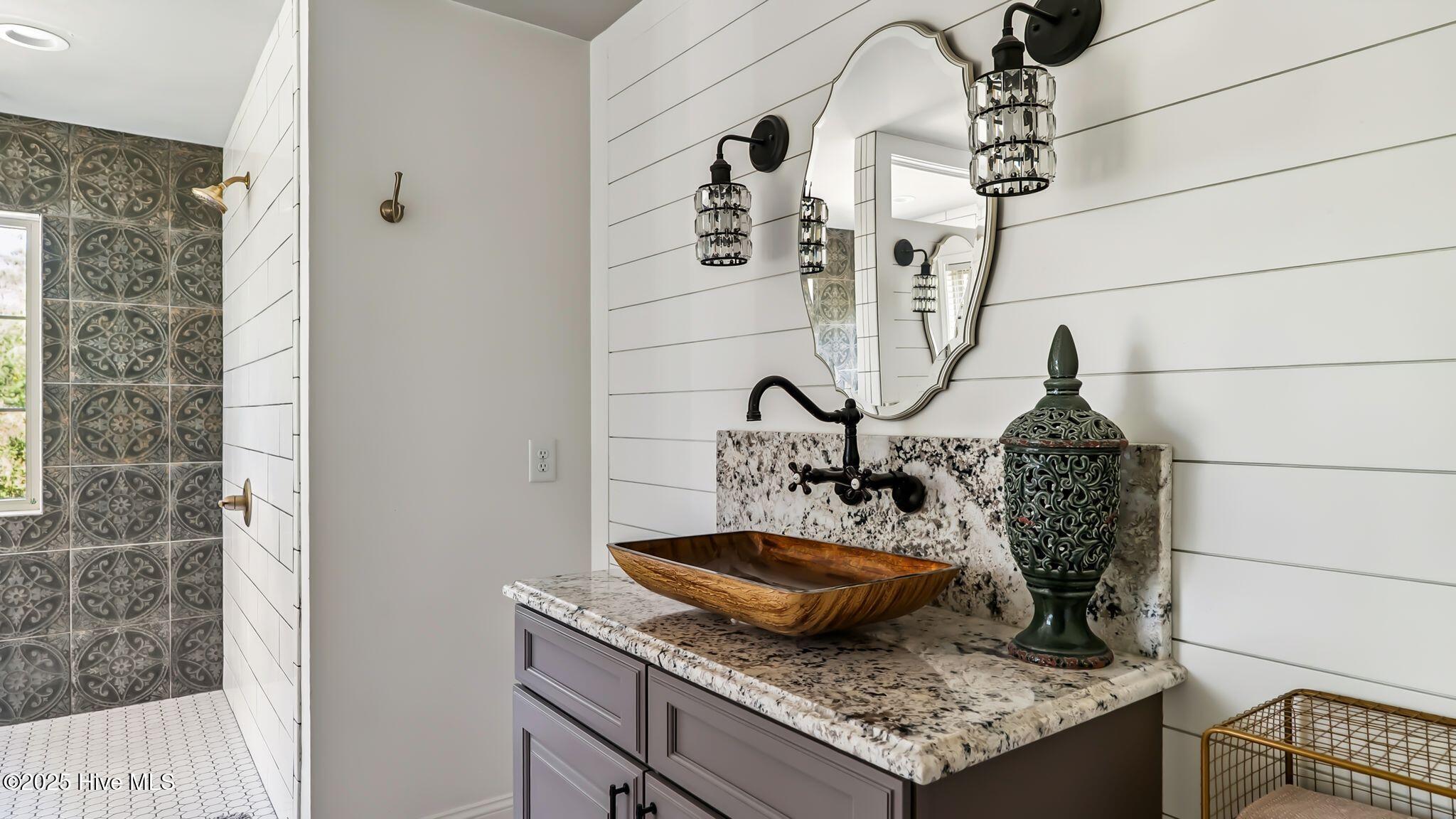 1336 McCaskill Road Carthage, NC 28327 - Photo 39 of 88 Master spa retreat with dual vanities, private water closet, panoramic estate views, and
jetted tub