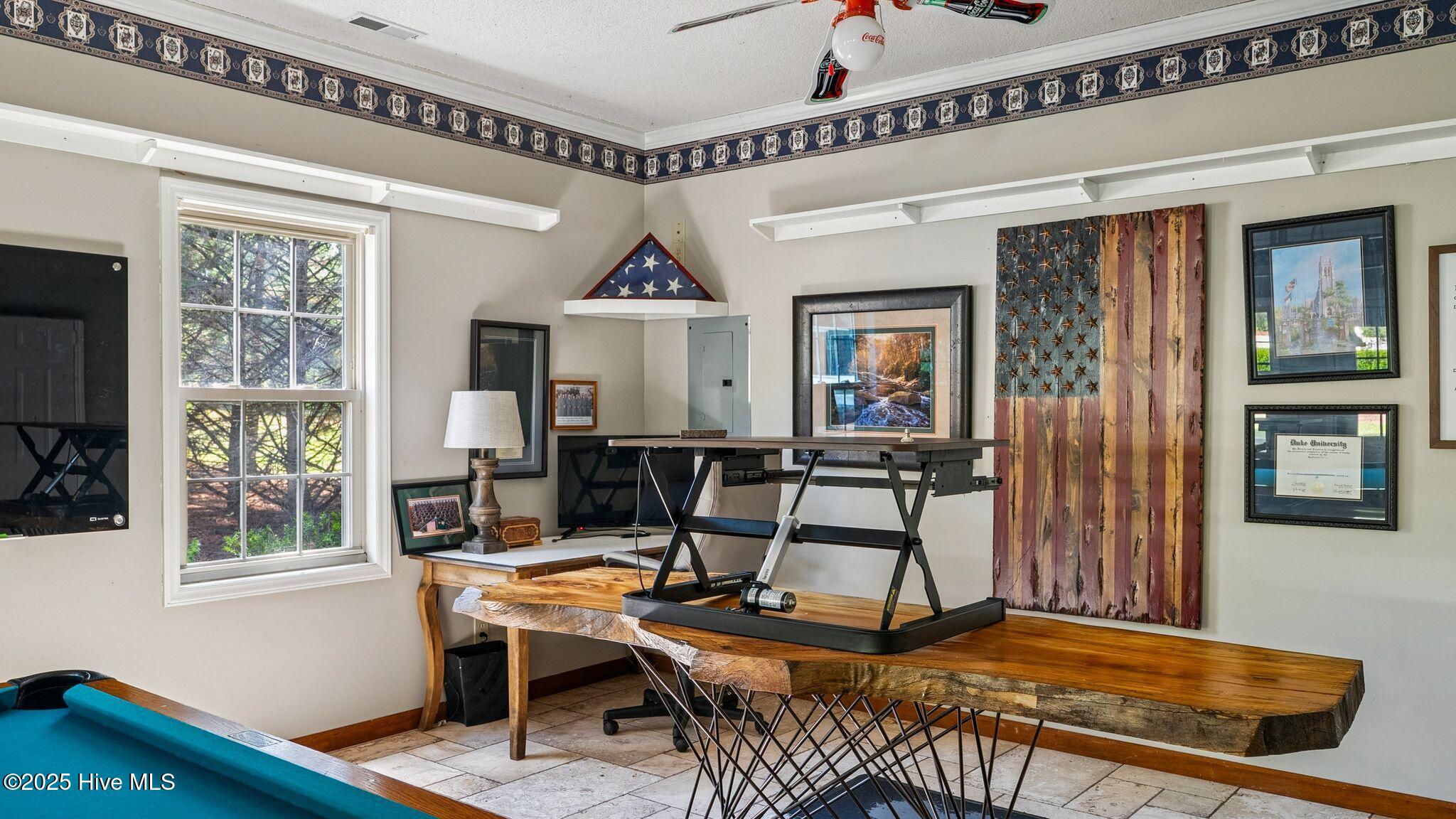 1336 McCaskill Road Carthage, NC 28327 - Photo 64 of 88 1,300 sq ft climate-controlled detached building with dedicated HVAC and electrical panel
ready for office/fitness/entertainment area - pool table to convey
Building includes additional garage parking for 3 cars + UTV/Golf Cart storage, built-in bench
tops and integrated compressor airlines